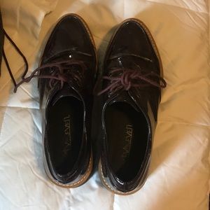 Purple patent leather platforms